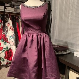 Plum sleeveless faille dress with beaded neckline